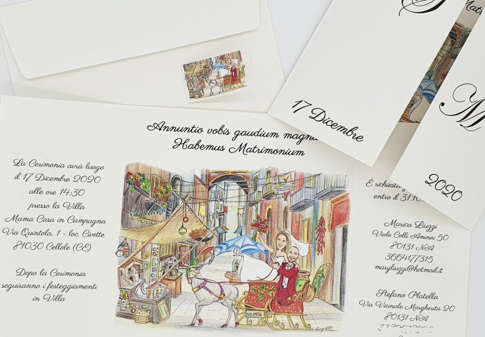 Partecipazione nozze finestra con disegno caricatura fedele di sposi su una slitta trainata da renne nella Via dei Presepi di Napoli